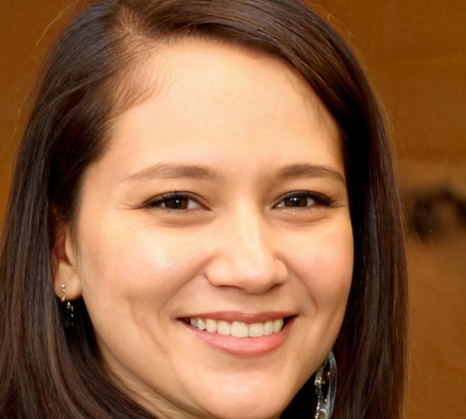 Portrait of satisfied student reviewing course materials